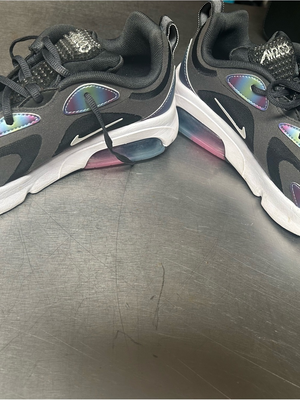 Nike Black Sneakers with Iridescent Accents and White Soles